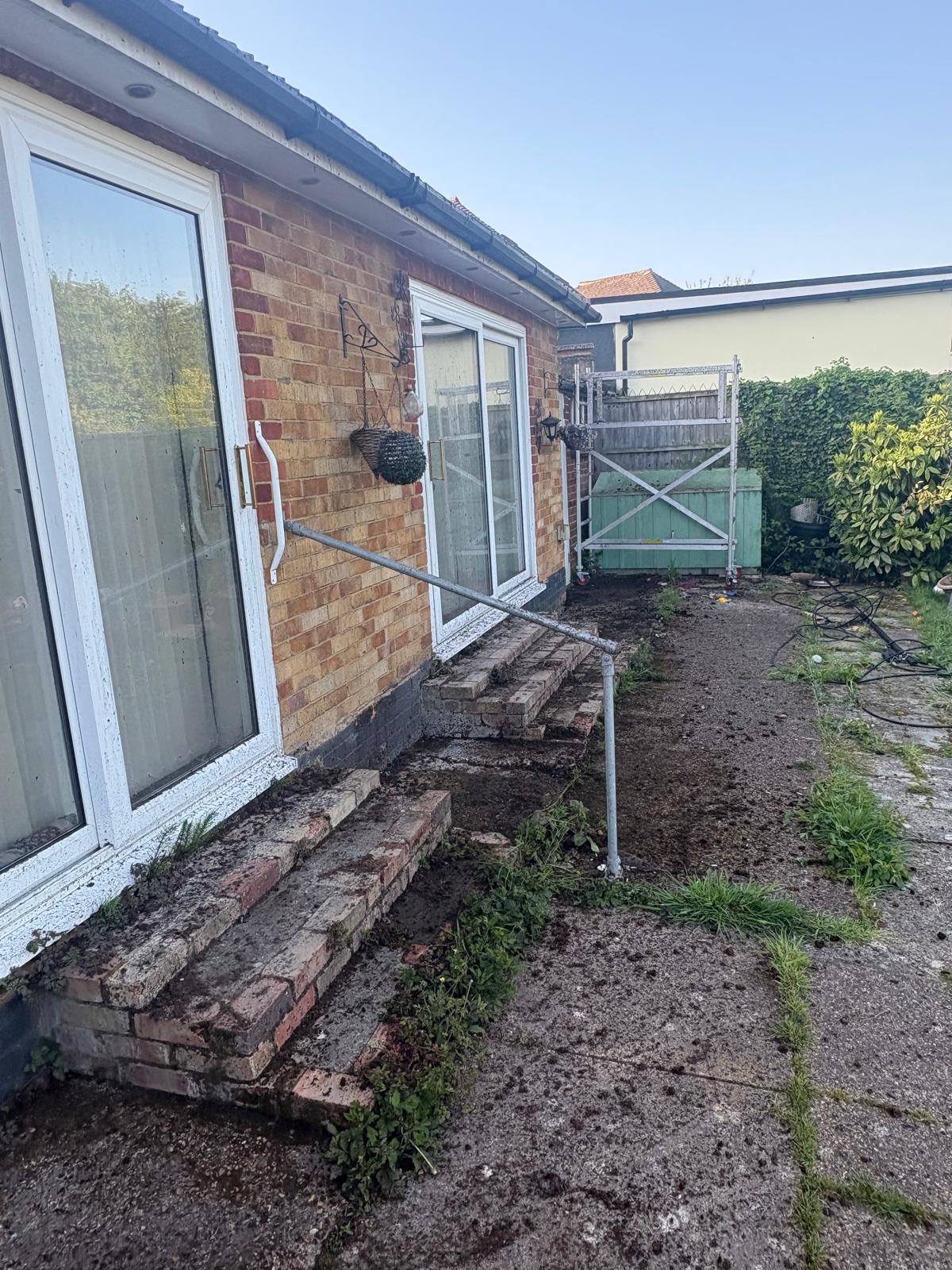 Pressure-washing work – patio and steps – before