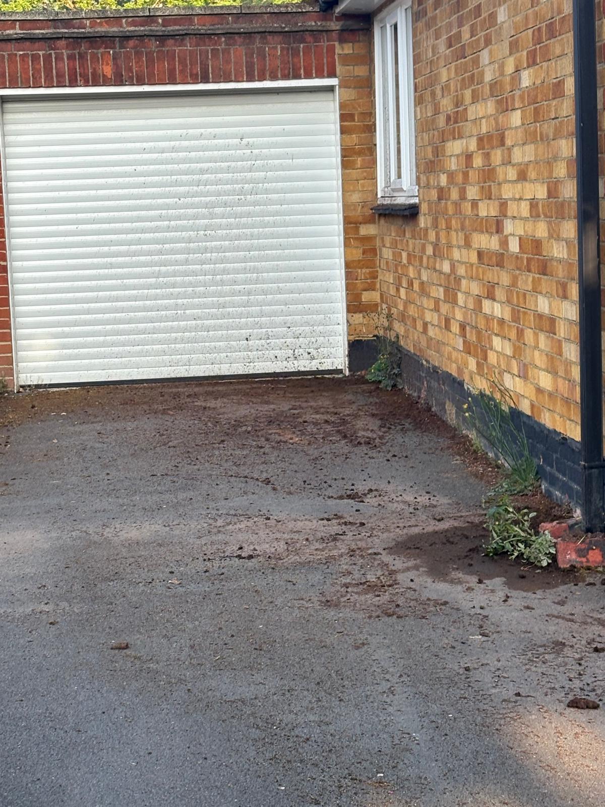 Pressure-washing work – garage driveway – before